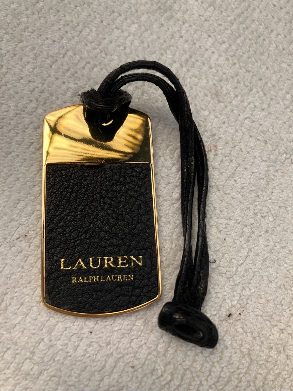 Lauren Ralph Lauren Black Pebbled Leather on Gold metal bag charm